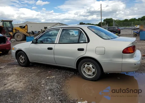 2002 Toyota Corolla Ce from USA, damaged, VIN 2T1BR12E72C583804